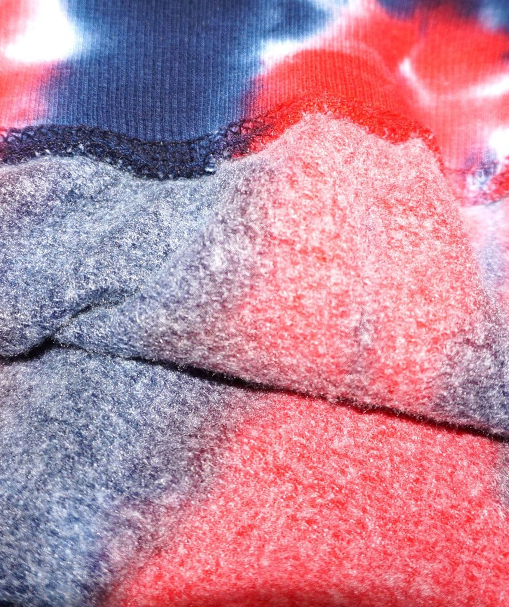 The super soft fabric the We Cloud 9 Grippy Tie Dye Hoodie is made of.