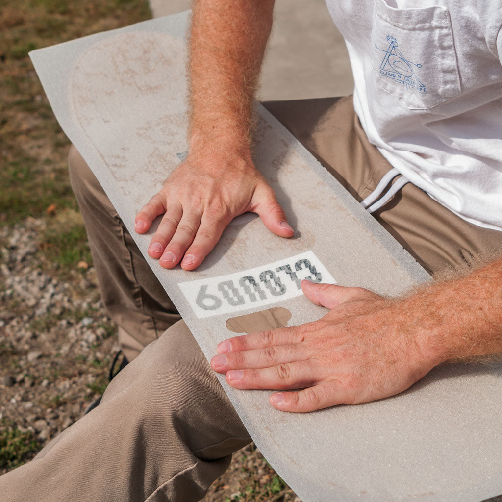 Press your grip tape into place.